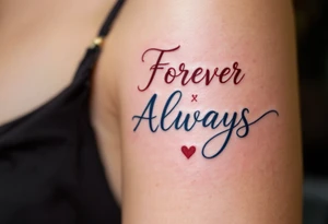 Elegant script “Forever” in burgundy for her and “Always” in navy for him inked over the heart show eternal devotion. tattoo idea