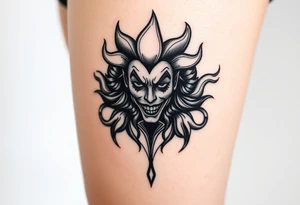 Powerful new age joker surrounded by flames tattoo idea