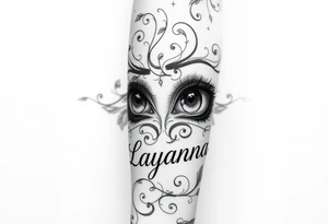 Girl eyes with the name layanna at the bottom of it tattoo idea