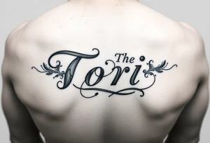 The name Tori on a man’s hand with designs tattoo idea