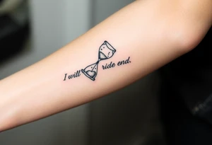 Broken hourglass was the sand transforming the hearts with the phrase.I will ride to the end tattoo idea