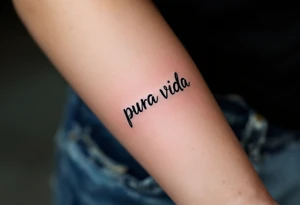 Minimalist “Pura Vida” in fine-line black, accompanied by a tiny golden sun and soft blue ocean wave. tattoo idea