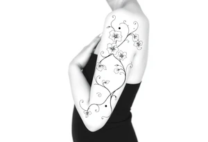 Swirly, art deco, filigree style entangled morning glory vine tattoo idea