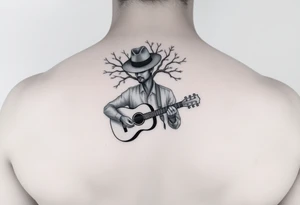 Man with hat but cant see face 
playing acoustic guitar underneath tree of life concept style tattoo idea