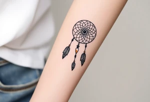 native dreamcatcher with flowing feathers and sacred beads tattoo idea