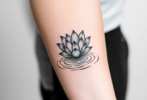 serene lotus flower emerging from sacred waters with ripples tattoo idea