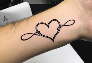 For man, back of wrist, infinity symbol plus heart plus word tb5 tattoo idea