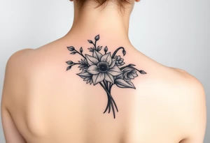 shoulder blade tattoo for women with bouquet of daffodils, daisy, lily of the valley tattoo idea