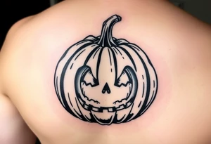 Spooky carved pumpkin tattoo idea