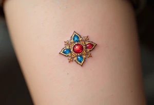 Three jewels symbol in crimson, blue, and gold, representing Buddha, Dharma, and Sangha. tattoo idea