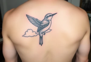 Kentucky bluebird with realistic clouds tattoo idea