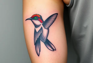 A hummingbird with a single glowing green eye, inspired by the Eye of Horus (only red , blue and black are possible colors) tattoo idea