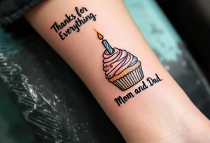 A candy-colored cupcake with a candle and the words “Thanks for Everything, Mom and Dad” in script. tattoo idea