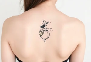 Coconut with a lime and a dancing witch girl tattoo idea