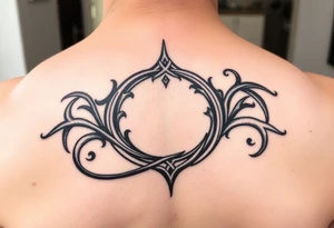 tribal open scroll tattoo idea