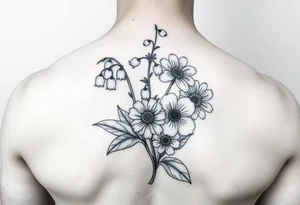 small lily of the valley, marigold, and chrysanthemum tattoo idea