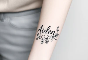 The name Aiden with a love them around it for the forearm tattoo idea