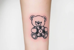 minimalist teddy bear smiling and holding a vinyl record tattoo idea