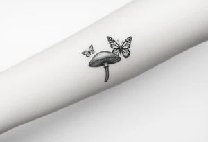 mushroom with 2 butterflies above it on your lower inner arm tattoo idea