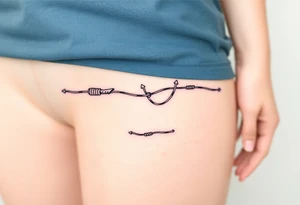 Razor wire shaped in ❤️ tattoo idea