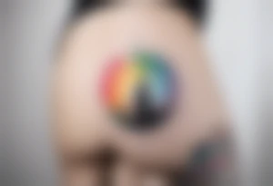 "You never walk alone" stars and rainbow color tattoo idea