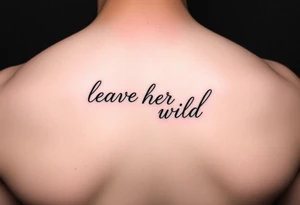 small fine line script tattoo of words "leave her wild" tattoo idea