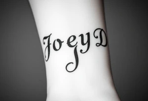 The words Joey D written with a large scale fancy J at the start tattoo idea