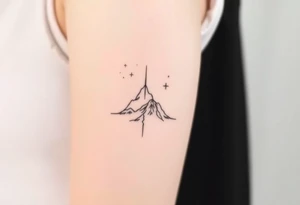 Two minimalist mountains stacked vertically, one sharp and clear at the top, the other fading into mist at the bottom tattoo idea