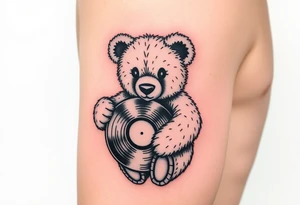 masculine teddy bear holding a vinyl record tattoo idea