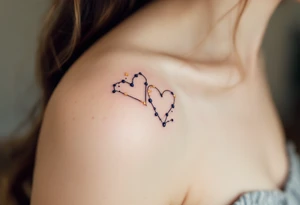 Two fine-line hearts joined by a delicate constellation with gold and navy blue accents.
Placement: Inner forearm, matching for both partners. tattoo idea