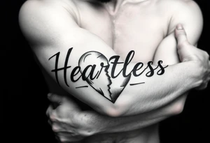 Heartless words written with broken real heart tattoo idea