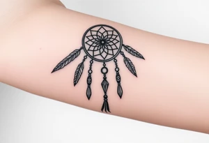 native dreamcatcher with flowing feathers and sacred beads tattoo idea