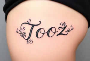Tooz in cursive surrounded by large geers tattoo idea