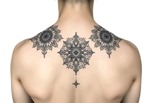 spine tattoo design with symmetrical ornamental patterns, combining dotwork, mandala elements, and flowing lines that follow the natural curves of the body. The design is intricate and balanced tattoo idea