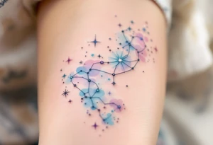 A subtle Aries star constellation map in pastel blues and pinks celebrates the zodiac sign’s cosmic connection with a soft elegance. tattoo idea