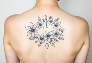 lilies, cherry blossoms and daffodils with some leaves in a circular formation tattoo idea