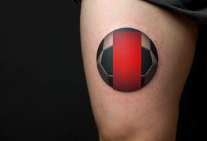 A modern design with a minimalist black ball and just one red panel showing the club star. tattoo idea