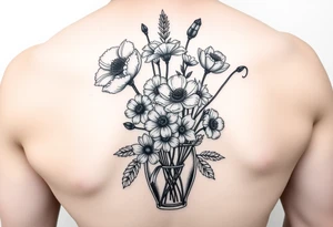 poppy, gladiolus, holly, narcissistic, daisy, and sweet pea in a vase tattoo idea