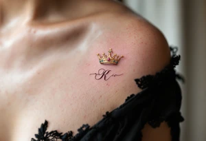 Gold-inked royal crowns with tiny emerald and ruby details, placed above matching initials. tattoo idea