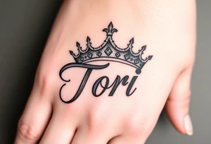 Name Tori with big crown tattoo idea