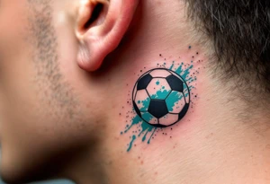 A small behind-the-ear soccer ball tattoo in black with a splash of teal paint. tattoo idea