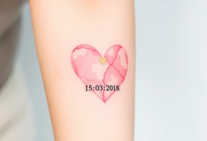 A soft watercolor heart in pastel pink and ivory, with golden dust accents, with wedding date 15.03.2018 tattoo idea