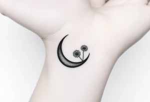 Small black and white tattoo waxing crescent moon with small Daisy birth flower and tiny Leo gliph tattoo idea