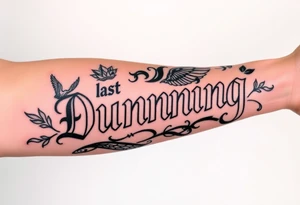Last name Dunning, in Roman bold font in middle of forearm with background including leaves,angel wing going near elbow,tribal pattern. tattoo idea
