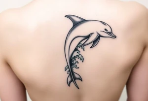 Dolphin and waves on spine tattoo idea