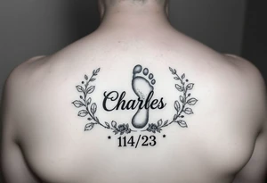 Baby footprint surrounded by the name Charles and the date 1/14/23 and floral vines tattoo idea