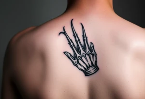 Freddy Krueger showing his claw tattoo idea