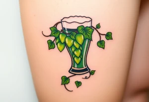 A hop vine wrapping around a pint glass, with delicate tendrils and leaves in vibrant green shades tattoo idea