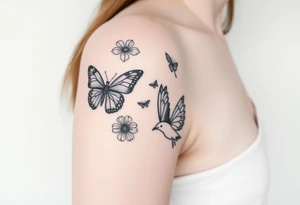 Show me an upper arm/shoulder/shoulder blade tattoo design with a birth flower for July, July, January, September, and 3 butterflies, and a raven and an eagle tattoo idea