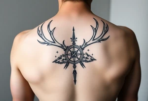 Spine tattoo of elk and deer antlers, a compass, and mountains tattoo idea